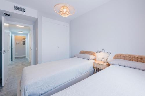 Giường trong phòng chung tại Vitta Natur - 3-bedroom luxury apartment with SPA