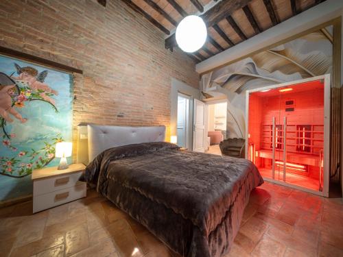 Ένα ή περισσότερα κρεβάτια σε δωμάτιο στο La casa del Prete