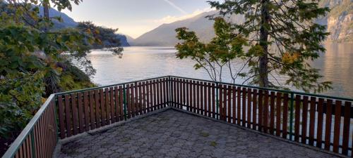 a balcony with a view of a body of water at Apartment am See in Murg