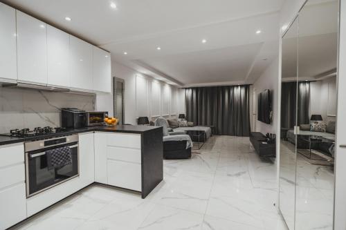 Η κουζίνα ή μικρή κουζίνα στο Parque Santiago 1 luxury apartament 229 pool view
