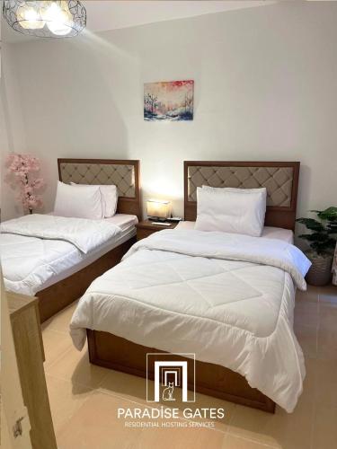 Ένα ή περισσότερα κρεβάτια σε δωμάτιο στο Paradise Gates Madinaty
