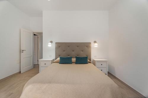 Ένα ή περισσότερα κρεβάτια σε δωμάτιο στο Casa Elvira