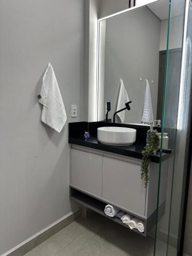 Ванная комната в Studio Aconchego Poços - Minimalista e bem localizado