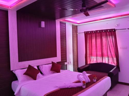 Postel nebo postele na pokoji v ubytování La Seven Resorts