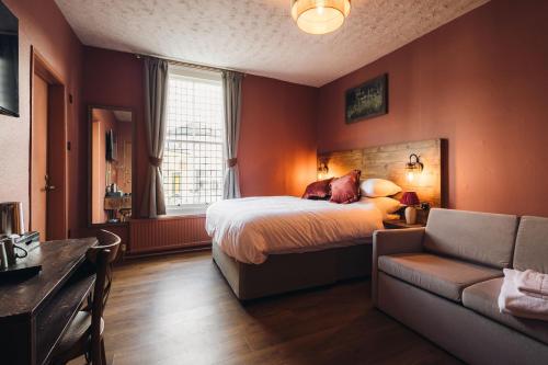 Postel nebo postele na pokoji v ubytování Coaching Inn