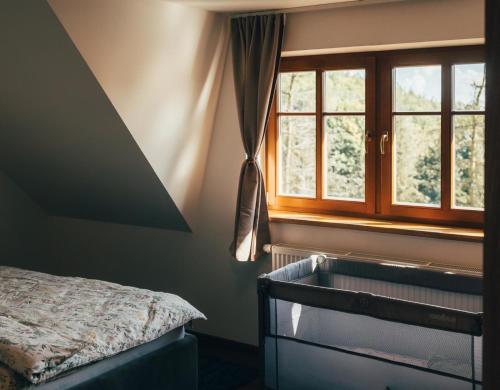 Ένα ή περισσότερα κρεβάτια σε δωμάτιο στο Samota 88