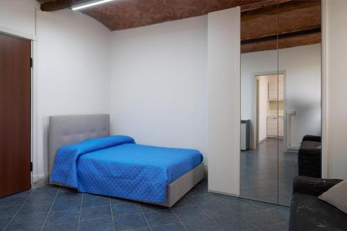 En eller flere senge i et værelse på Mini a Carpi