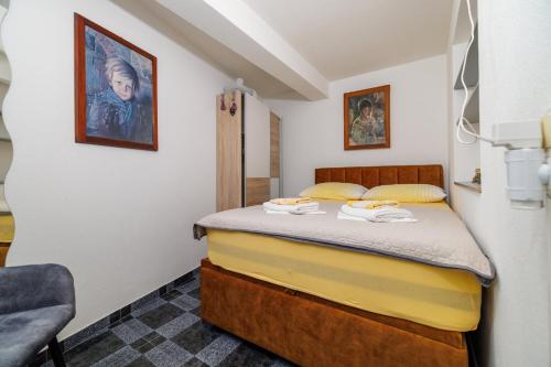 a bedroom with a bed in a room at Villa Solterra in Grižane