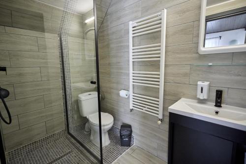 Koupelna v ubytování Apartamente cu 3 dormitoare SuperSki