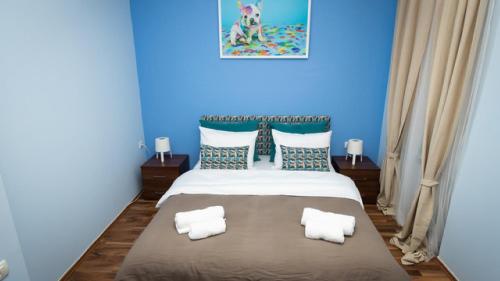 Ένα ή περισσότερα κρεβάτια σε δωμάτιο στο Jasha Apartments