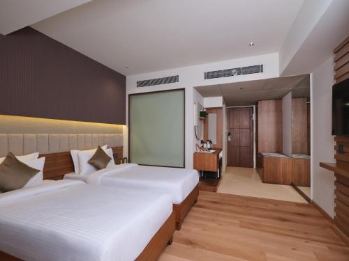 Fotografie z fotogalerie ubytování Regenta Place Ahmedabad v destinaci Ahmadábád