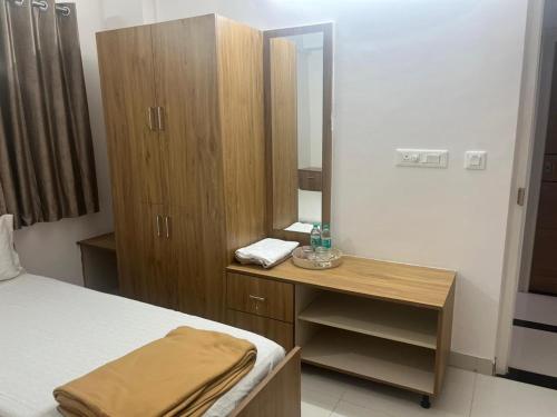 Ένα ή περισσότερα κρεβάτια σε δωμάτιο στο The Grand Inn