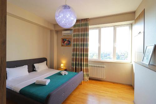 Llit o llits en una habitació de Wehost-Dream Penthouse