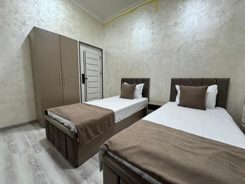 Postel nebo postele na pokoji v ubytování Art Home Hotel