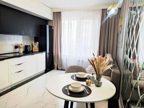 Η κουζίνα ή μικρή κουζίνα στο Островок комфорта и современности