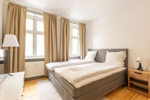 Katil atau katil-katil dalam bilik di Authentic Copenhagen Apartment for 4 Guests