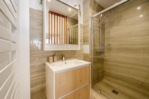 Koupelna v ubytování Appartement charmant au coeur du 16eme