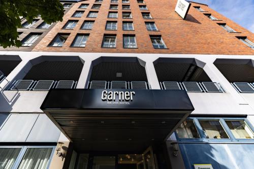a view of the exterior of a building at Garner Hotel Cologne Porz - Airport by IHG in Cologne