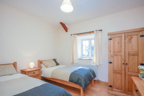 En eller flere senge i et værelse på Bryncaled