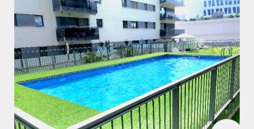 Πισίνα στο ή κοντά στο Ideal for families on the beach in Barcelona with a pool