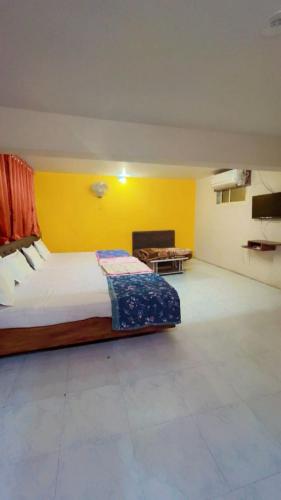 Ένα ή περισσότερα κρεβάτια σε δωμάτιο στο Hotel shree radhe palace