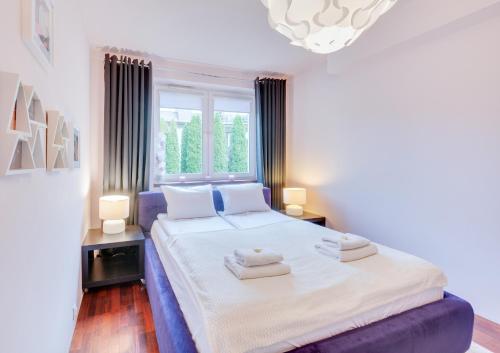 Katil atau katil-katil dalam bilik di Deluxe Apartment Smulsko Kids Room Terrace Parking