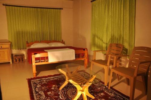 Ένα ή περισσότερα κρεβάτια σε δωμάτιο στο Wayanad Camping Hilltop