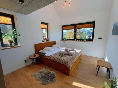 Ένα ή περισσότερα κρεβάτια σε δωμάτιο στο Výhledovka chalet