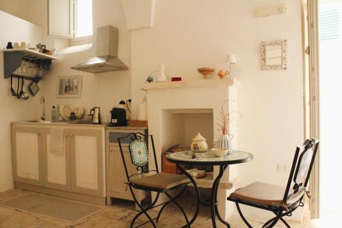 Η κουζίνα ή μικρή κουζίνα στο Casa vacanze PetraCielo