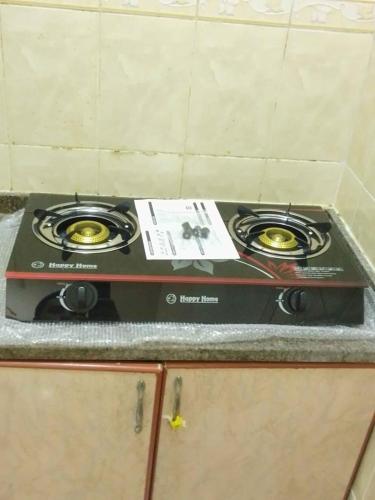 a stove top oven sitting on top of a counter at استوديوهات وغرف in Ras al Khaimah