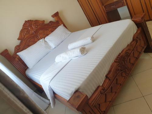 Ένα ή περισσότερα κρεβάτια σε δωμάτιο στο Esther comfy homes