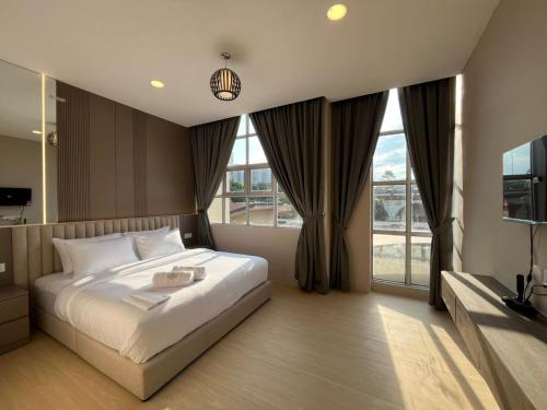 Ένα ή περισσότερα κρεβάτια σε δωμάτιο στο Royal Guest House RGH