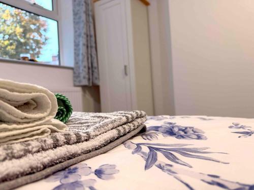 Ένα ή περισσότερα κρεβάτια σε δωμάτιο στο The Modern Muse