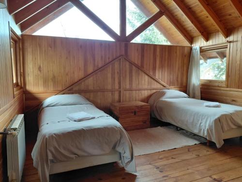 Un ou plusieurs lits dans un hébergement de l'établissement Casa céntrica SONNE San Martín de los Andes