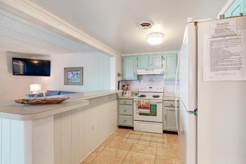 Una cocina o cocineta en Camelot 401A