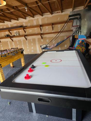 a ping pong table in a room with a ping pong table at 4 Bdrm Amazing Veiws in Cascade-Chipita Park