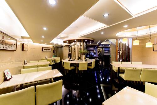 En restaurant eller et andet spisested på Kao Yuan Hotel - Zhong Shan