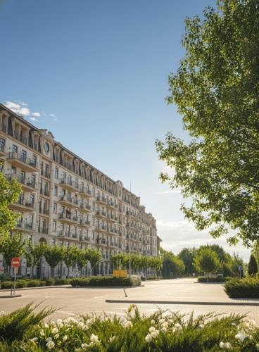 a large apartment building with a parking lot at Rivera Apartment Fontanka Sea in Fontanka