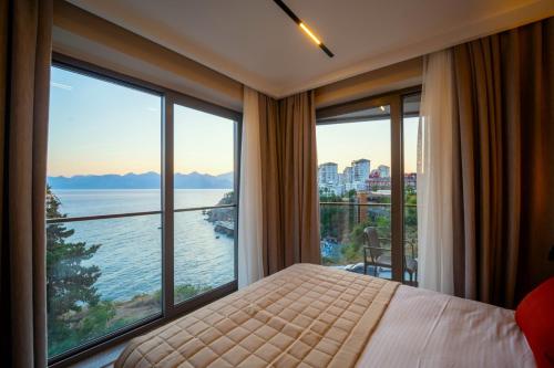 Ένα ή περισσότερα κρεβάτια σε δωμάτιο στο Reev Coffee Hotel