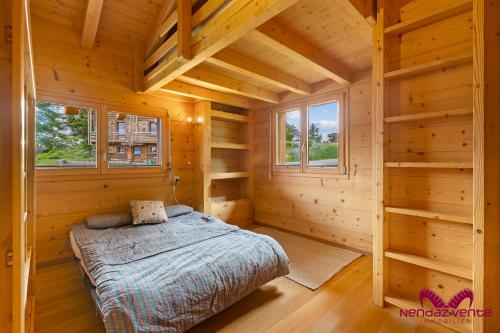 Postel nebo postele na pokoji v ubytování Chalet les Crêtaux