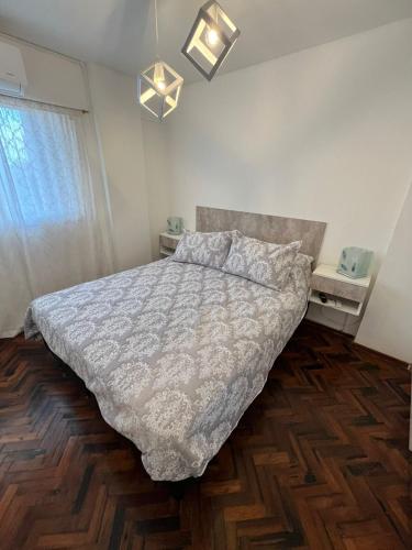 Postel nebo postele na pokoji v ubytování 9 de Julio Tempo