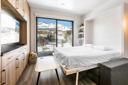Ένα ή περισσότερα κρεβάτια σε δωμάτιο στο Canyon Haus