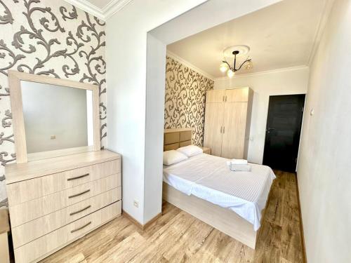 Postel nebo postele na pokoji v ubytování Lovely Modern 1 Bedroom Apartment Nearby Center