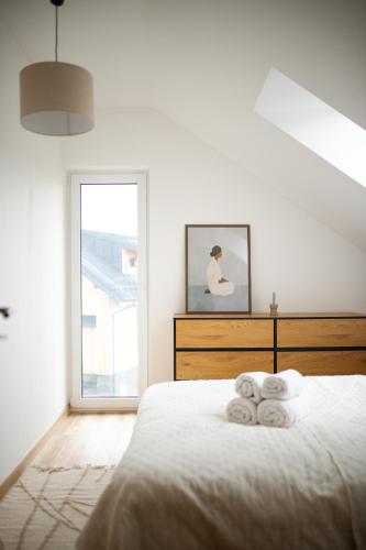 Postel nebo postele na pokoji v ubytování Útulný apartmán s výhledem na Lipno