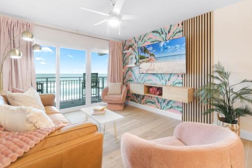 a living room with a view of the ocean at Paradise Beach Club - Oceanfront and Penthouse in Satellite Beach