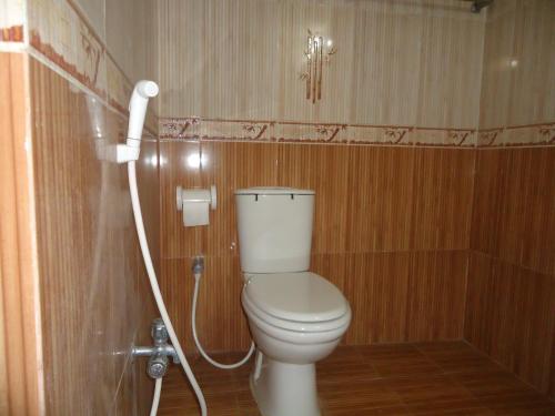 Ett badrum på Muscat Holiday Resort