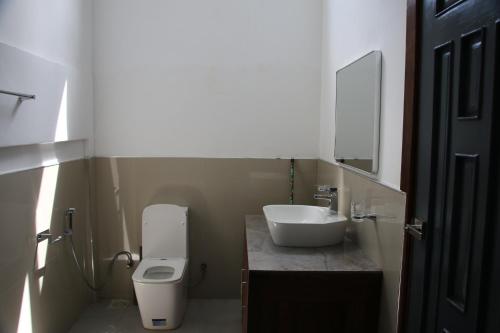 Koupelna v ubytování OMNA Villa