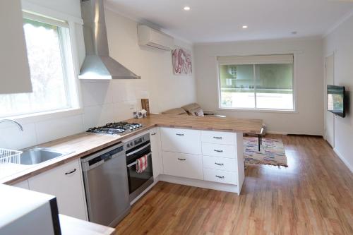 Cuina o zona de cuina de Downtown Bright