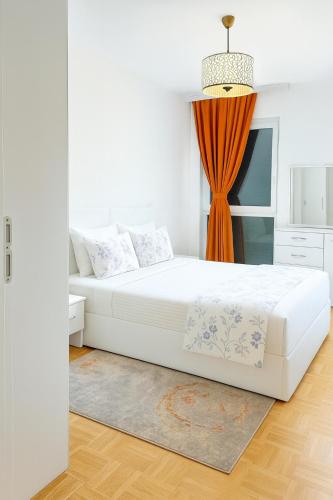 Ένα ή περισσότερα κρεβάτια σε δωμάτιο στο Peja Central Hideaway