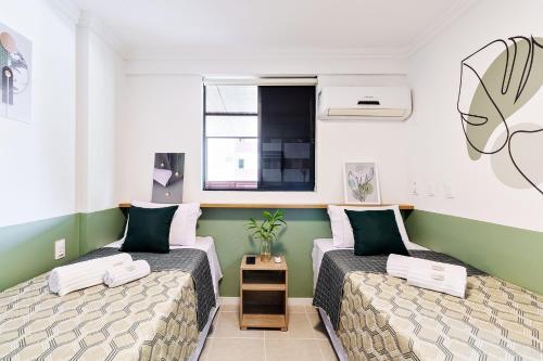 Ένα ή περισσότερα κρεβάτια σε δωμάτιο στο Flat espaçoso no Manaíra, a 100m da praia e ao lado do Mag Shopping